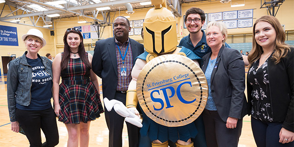trojan mascot with faculty